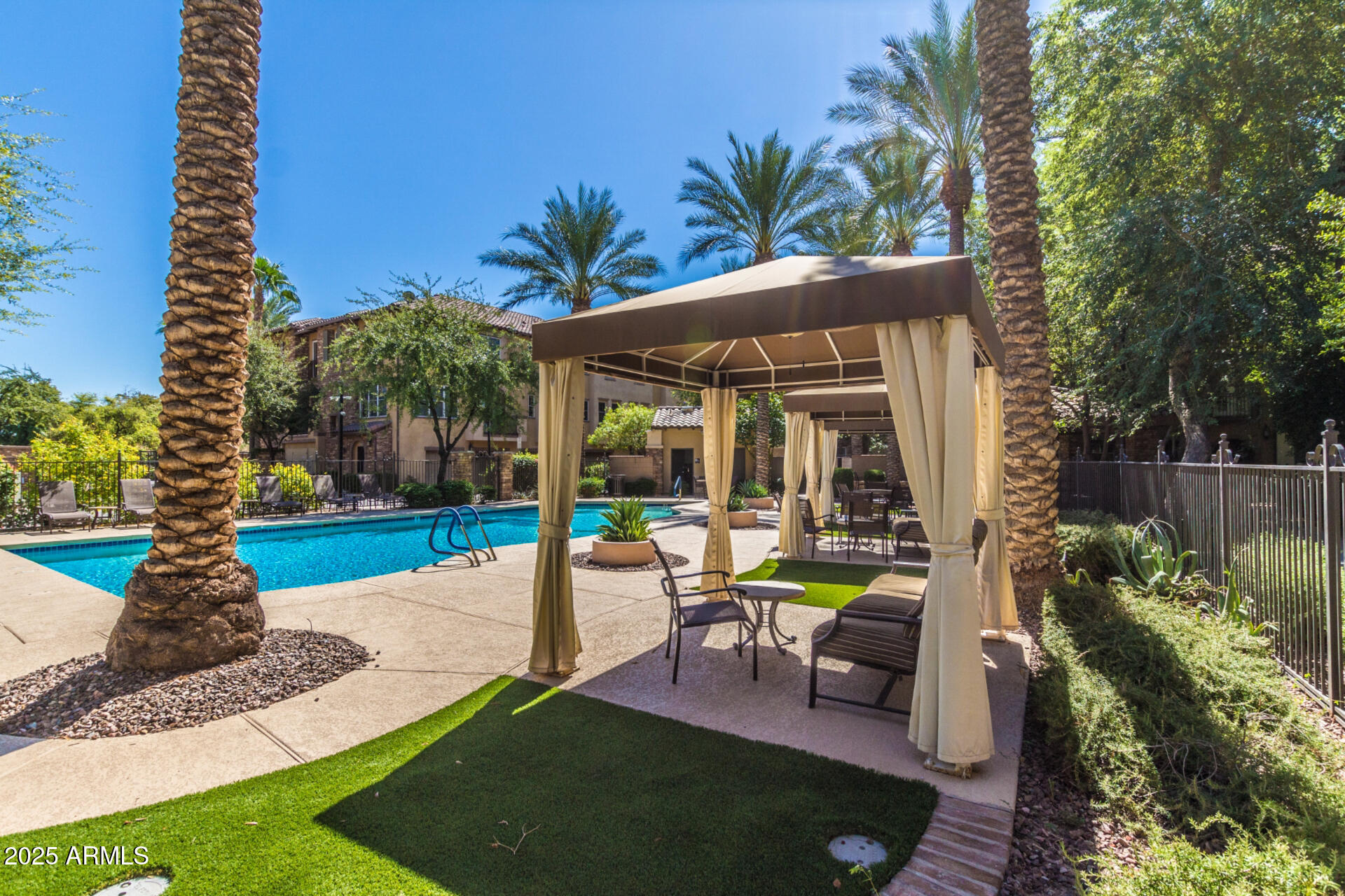 2482 East Roma Avenue Phoenix, AZ 85016 - Photo 28 of 39 a patio with table and chairs
