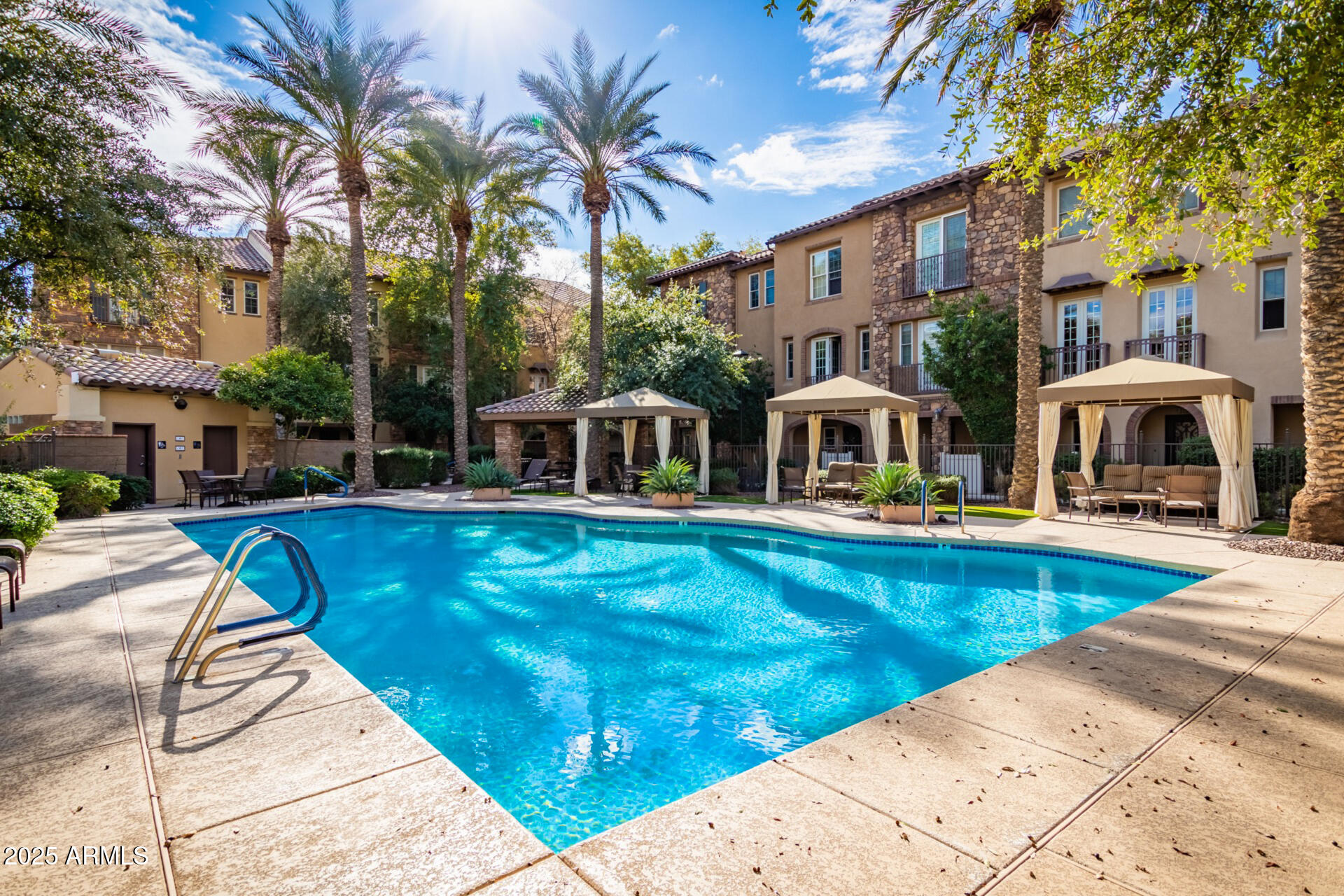 2482 East Roma Avenue Phoenix, AZ 85016 - Photo 29 of 39 a view of a swimming pool with a house