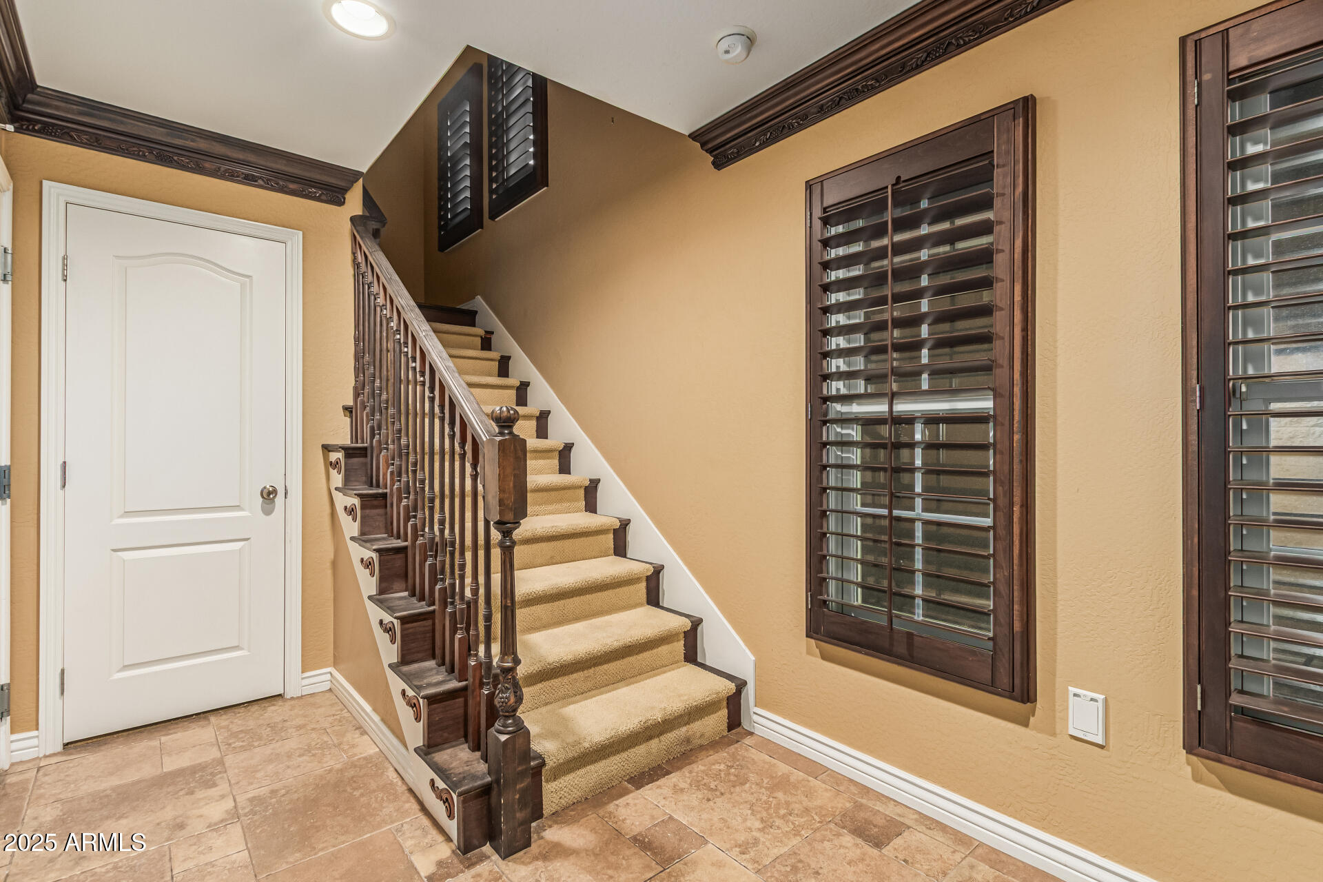 2482 East Roma Avenue Phoenix, AZ 85016 - Photo 3 of 39 a view of an entryway with staircase