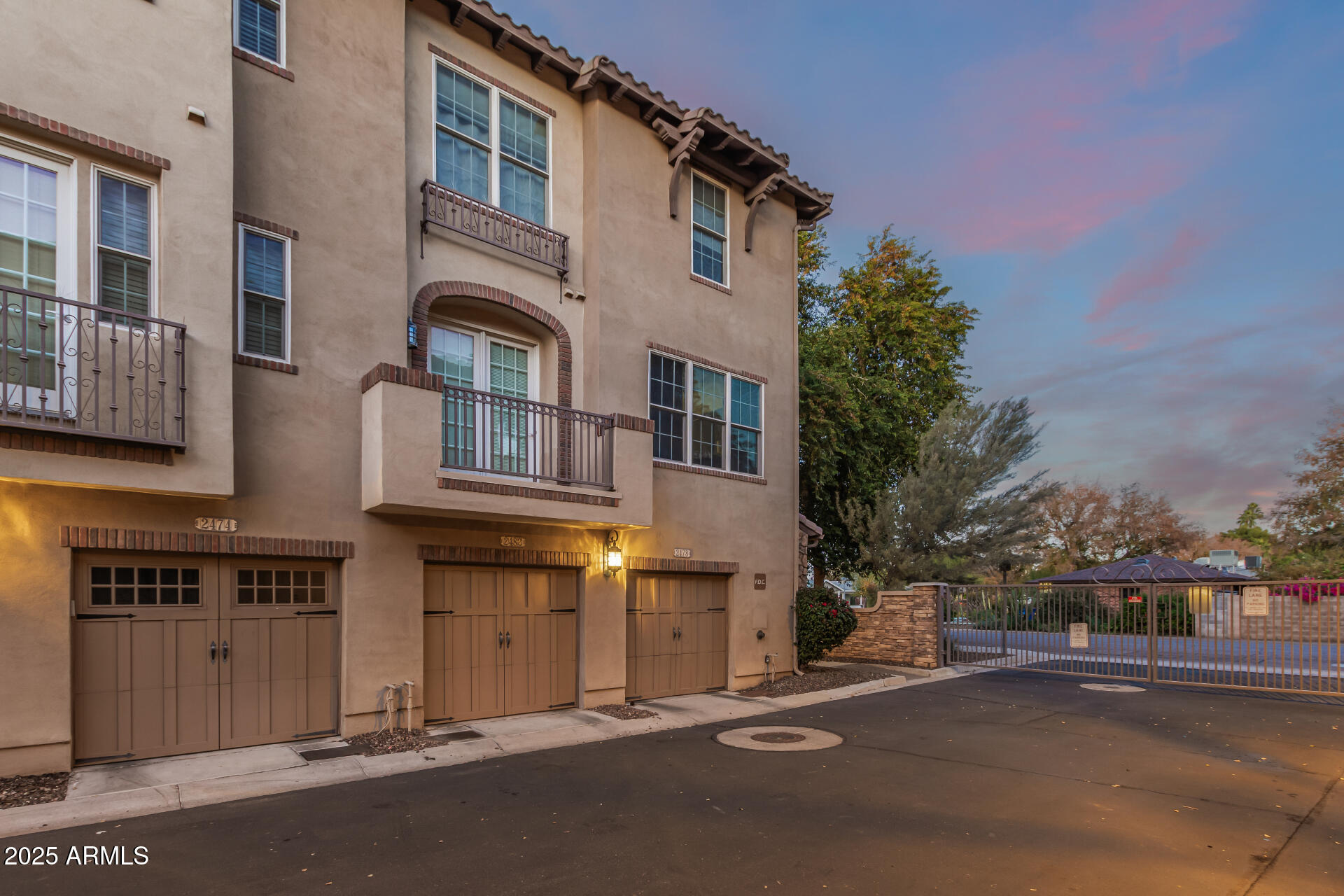 2482 East Roma Avenue Phoenix, AZ 85016 - Photo 37 of 39 a city street lined with buildings and trees