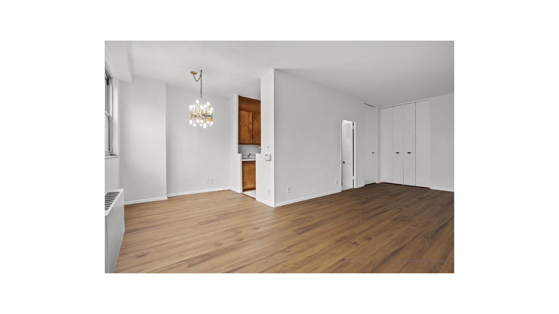 555 Kappock Street, Unit 4H Bronx, NY 10463 - Photo 11 of 16 a bathroom with a sink and a mirror