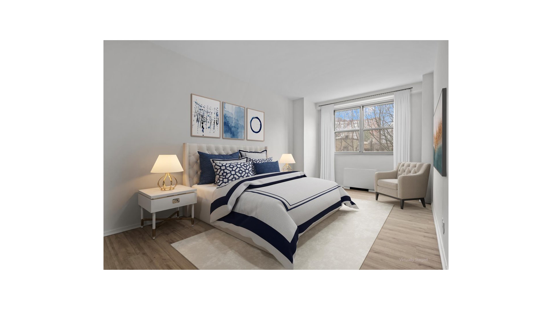 555 Kappock Street, Unit 4H Bronx, NY 10463 - Photo 14 of 16 a living room with a bed and a couch