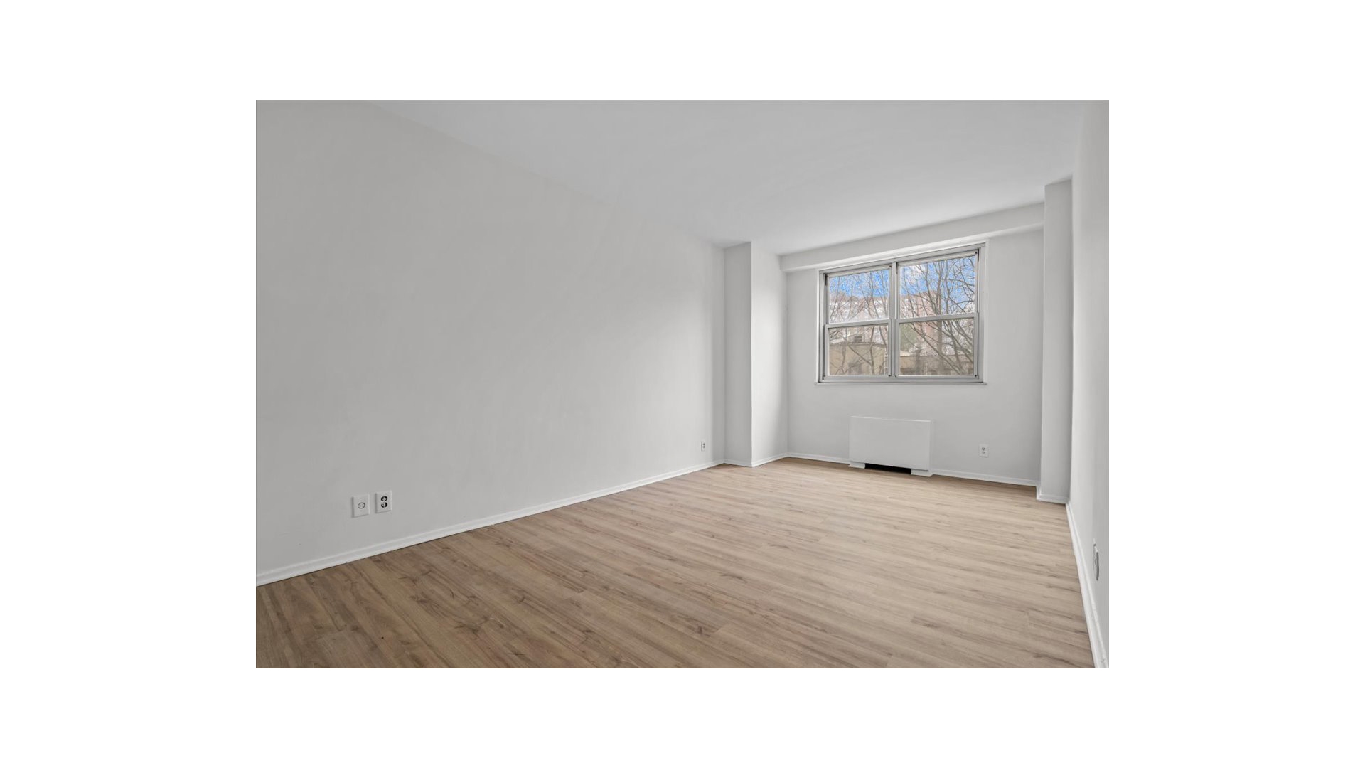 555 Kappock Street, Unit 4H Bronx, NY 10463 - Photo 15 of 16 a room with a window and cabinet