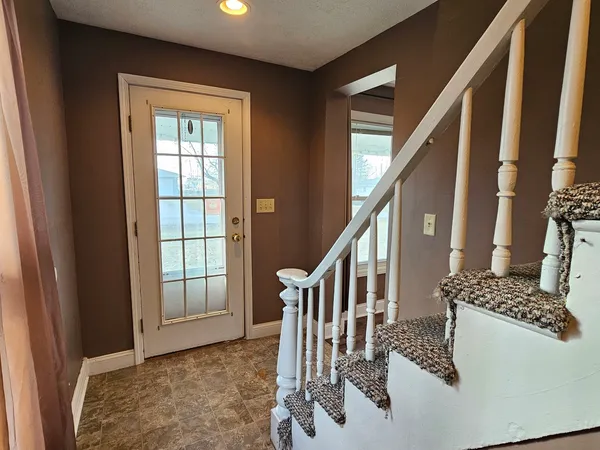 a view of entryway and workspace