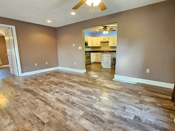 a view of a kitchen and a window