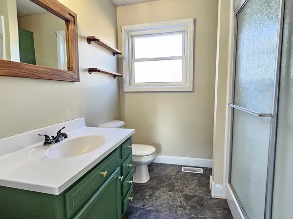 a bathroom with a sink and a toilet