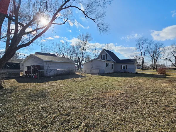 a house view with a garden space