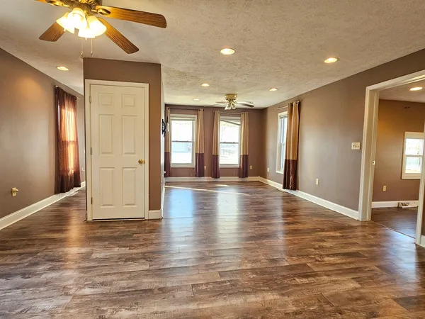 a view of a livingroom with a ceiling fan