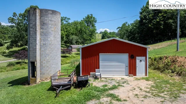 a living room with fireplace furniture and a flat screen tv