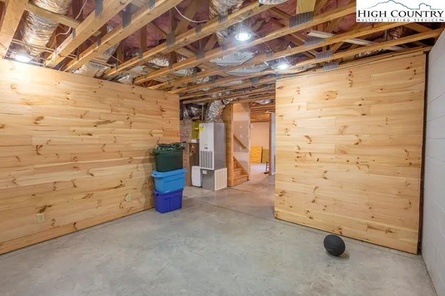 a view of an empty room with cabinet