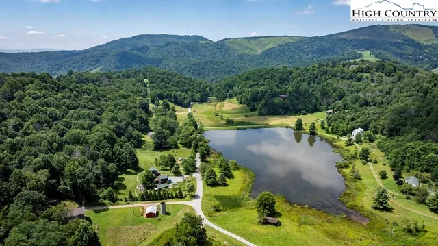 an aerial view of a house with a garden