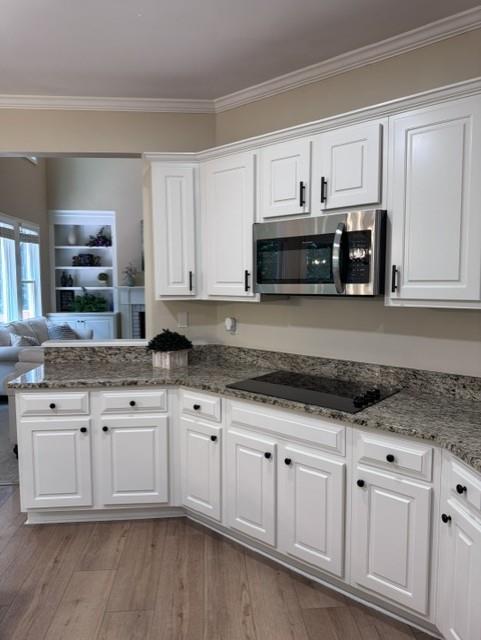 4055 Vista Point Lane Suwanee, GA 30024 - Photo 14 of 42 a kitchen with granite countertop a sink and cabinets
