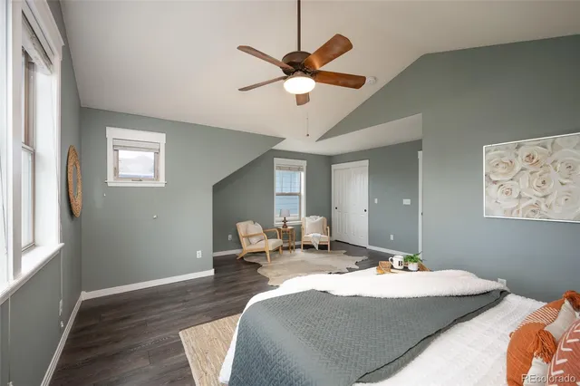 a bed room with bed and window