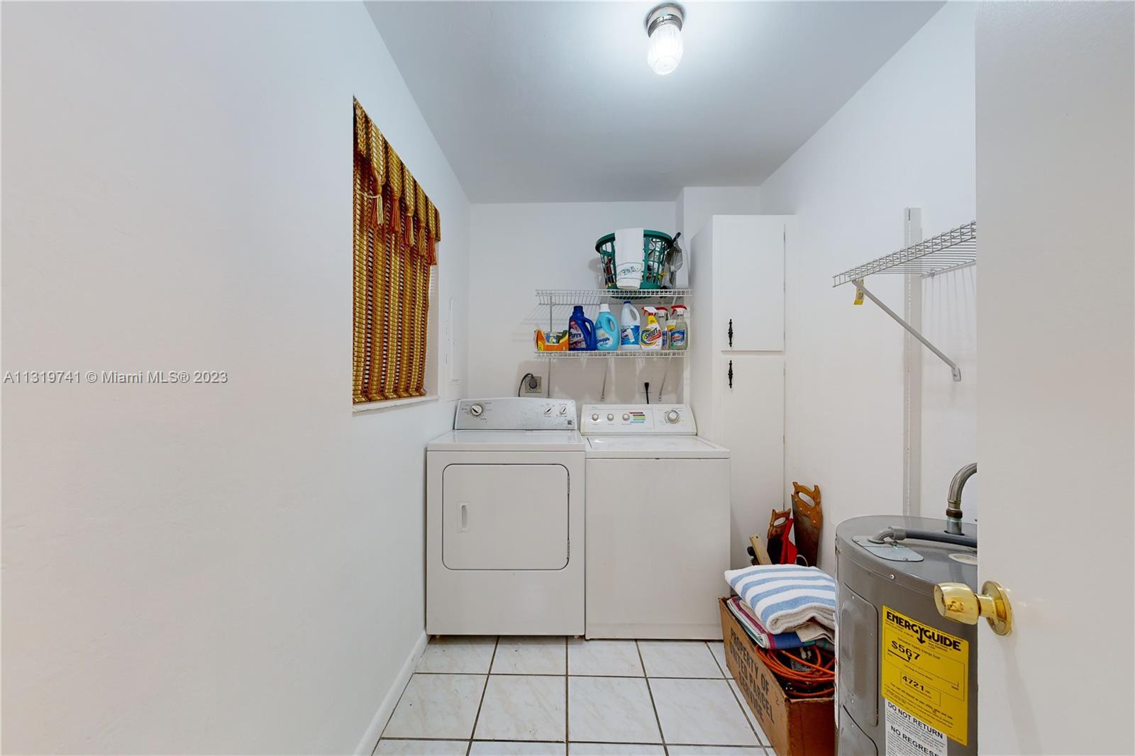 Hialeah Hialeah, FL 33014 - Photo 15 of 34 a utility room with dryer and washer