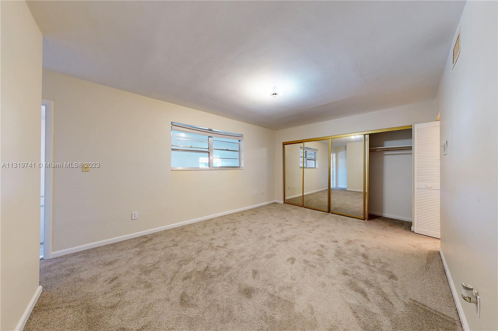 Hialeah Hialeah, FL 33014 - Photo 17 of 34 an empty room with windows