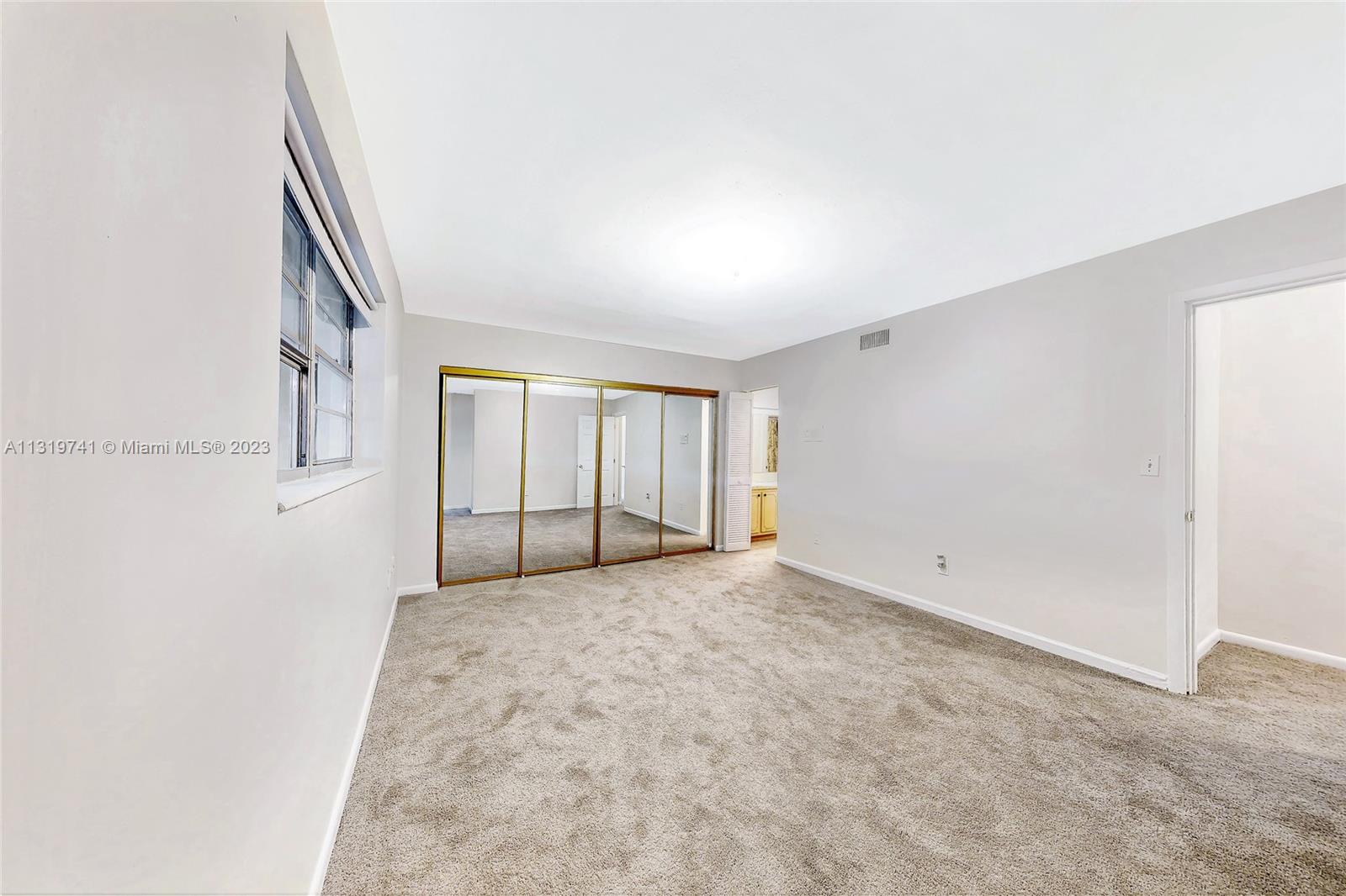 Hialeah Hialeah, FL 33014 - Photo 20 of 34 an empty room with windows