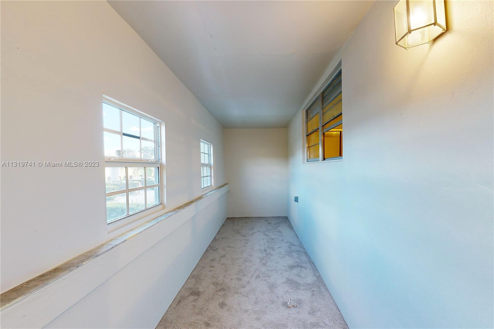 Hialeah Hialeah, FL 33014 - Photo 21 of 34 a view of an empty room with a window