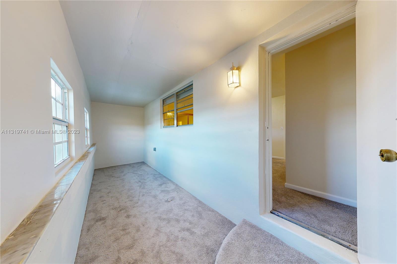 Hialeah Hialeah, FL 33014 - Photo 22 of 34 a view of an empty room with a window