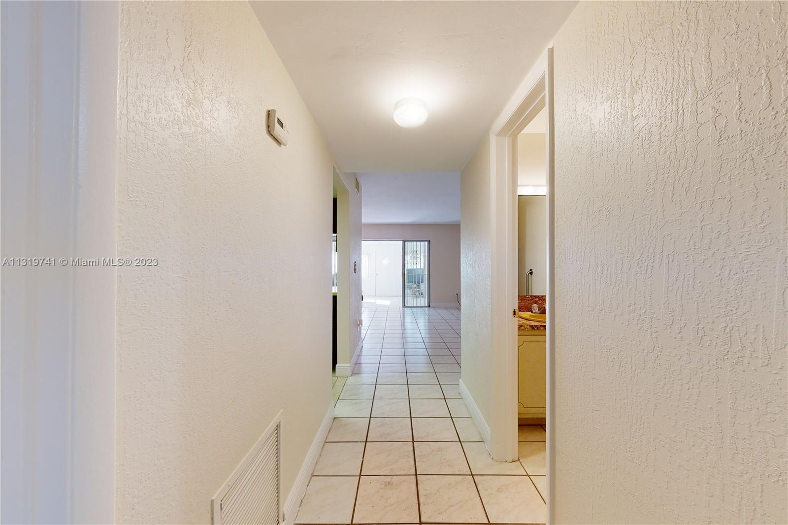 Hialeah Hialeah, FL 33014 - Photo 3 of 34 a view of a hallway