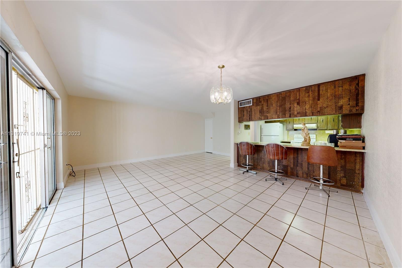 Hialeah Hialeah, FL 33014 - Photo 7 of 34 an empty room with windows