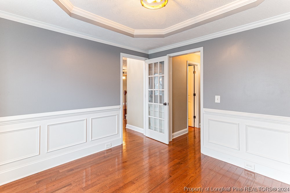 44 Ambrose Point Cameron, NC 28326 - Photo 23 of 48 a view of an empty room with wooden floor and a window