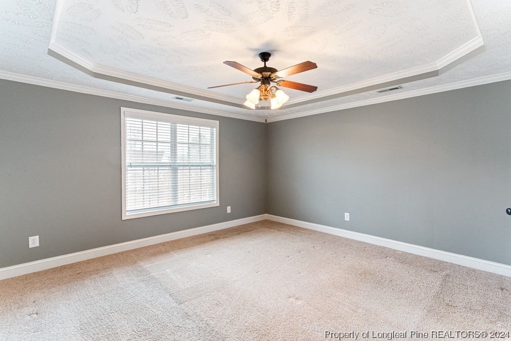 44 Ambrose Point Cameron, NC 28326 - Photo 28 of 48 an empty room with windows and fan