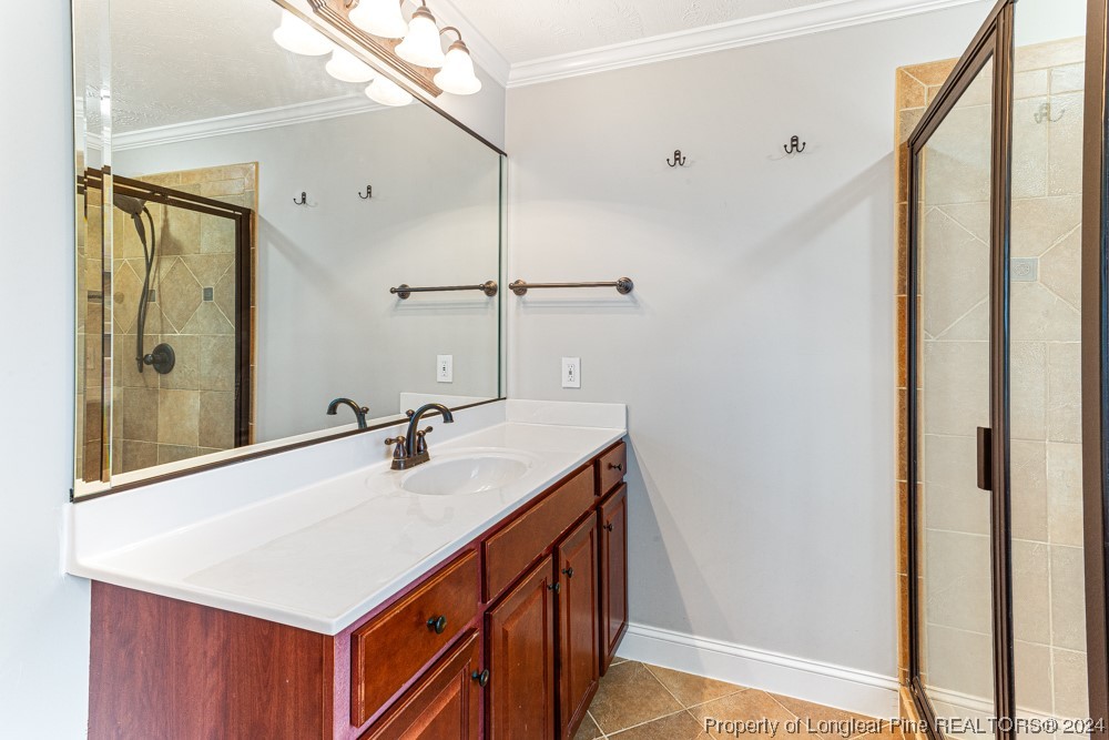 44 Ambrose Point Cameron, NC 28326 - Photo 31 of 48 a bathroom with a sink and a mirror