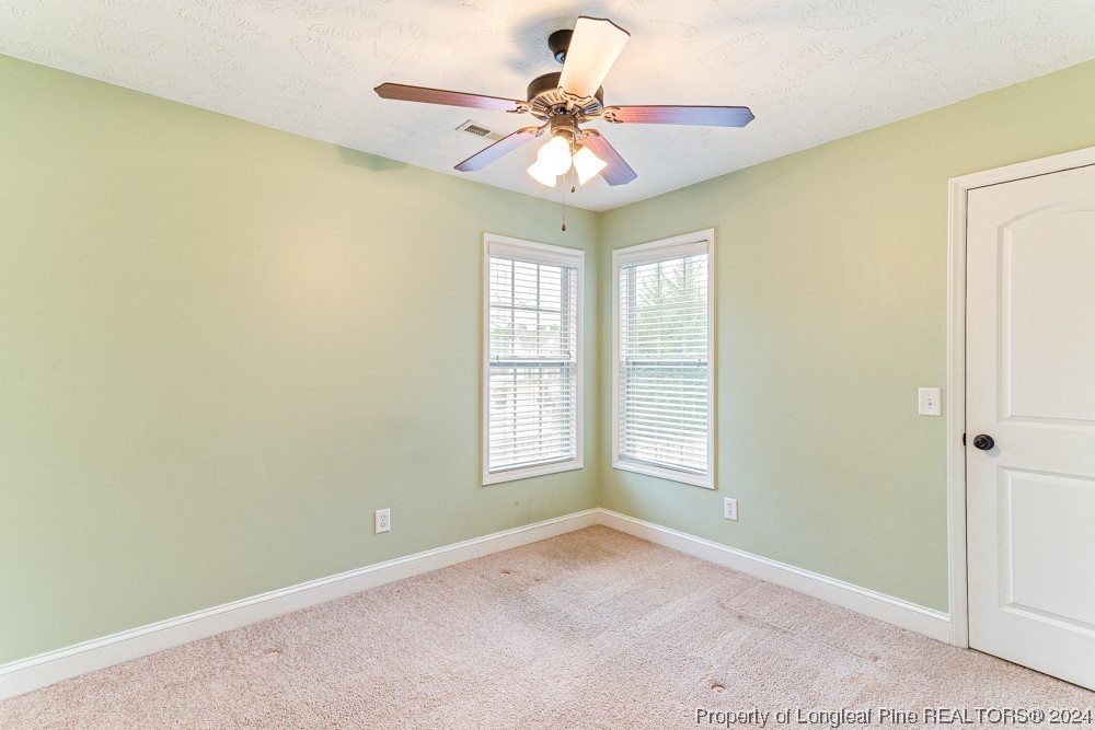 44 Ambrose Point Cameron, NC 28326 - Photo 34 of 48 an empty room with windows and fan