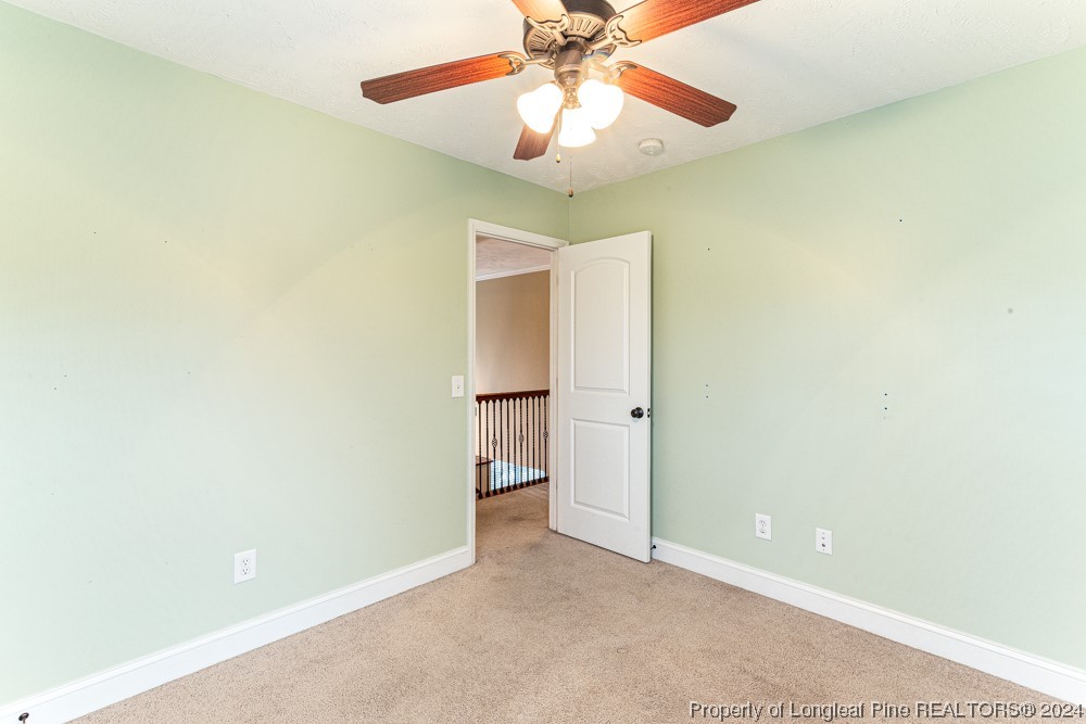 44 Ambrose Point Cameron, NC 28326 - Photo 35 of 48 a view of an empty room and chandelier fan