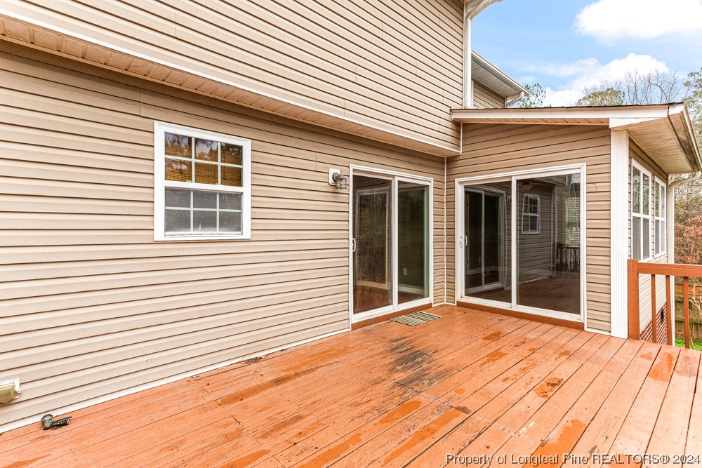 44 Ambrose Point Cameron, NC 28326 - Photo 42 of 48 a view of a house with wooden deck