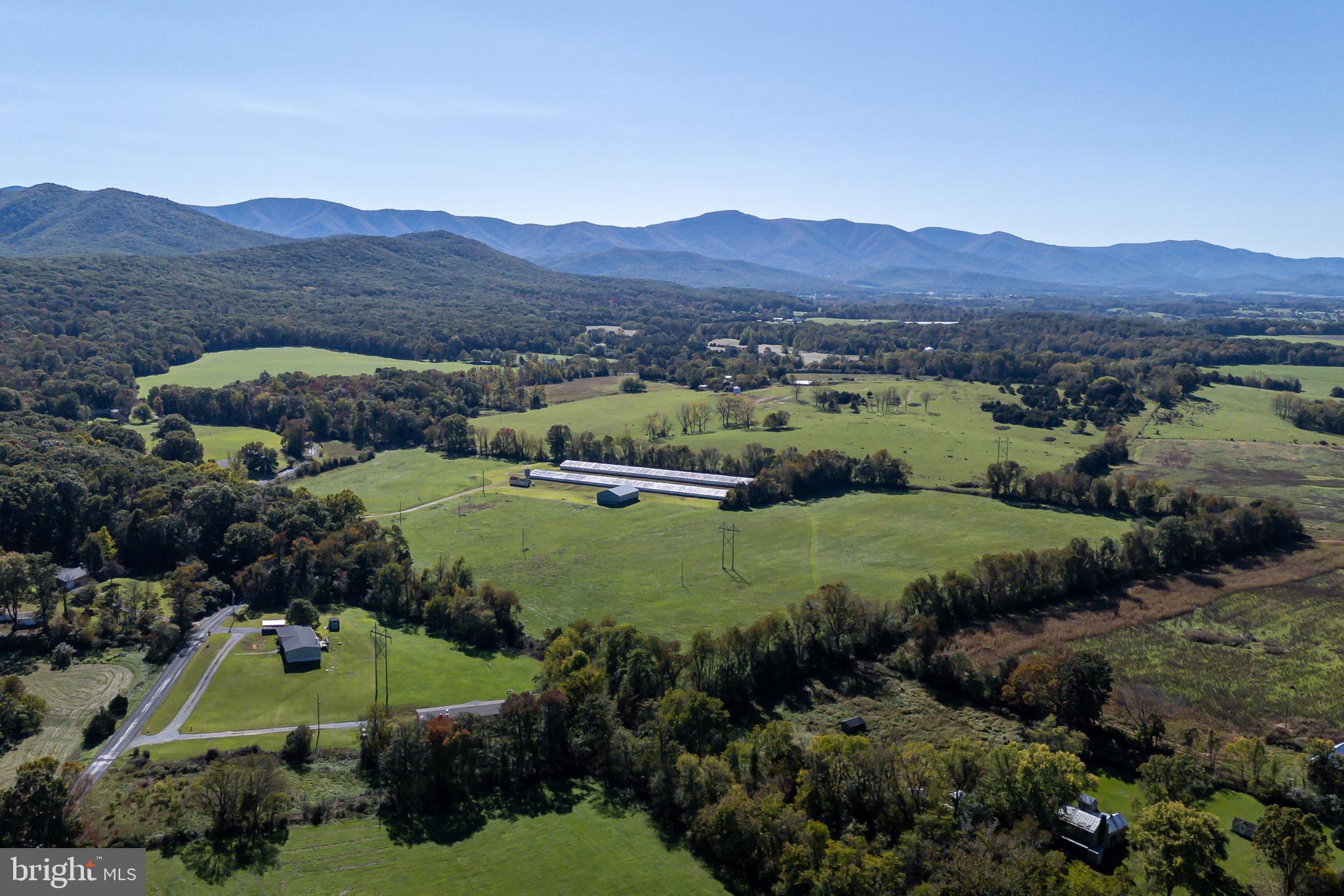 Vaughn Summit Road Luray, VA 22835 - Photo 6 of 31 a view of a lush green hillside and houses