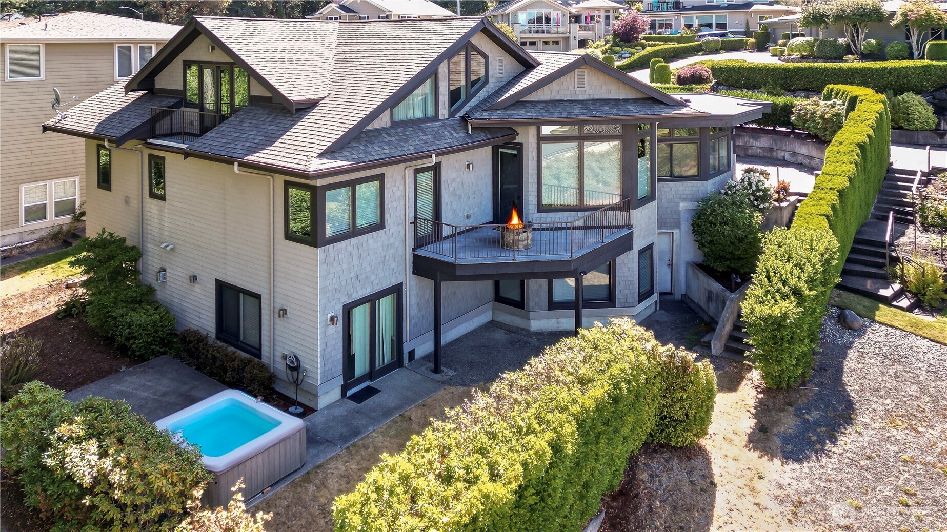 1207 Adams Street Steilacoom, WA 98388 - Photo 24 of 25 a front view of a house with a garden