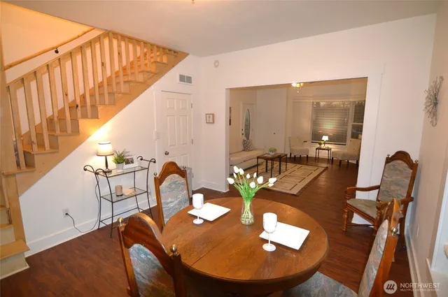 a kitchen with stainless steel appliances granite countertop a stove and a refrigerator
