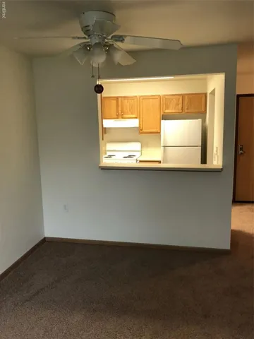 a view of a window in an empty room