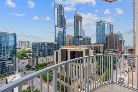 a view of city from a balcony
