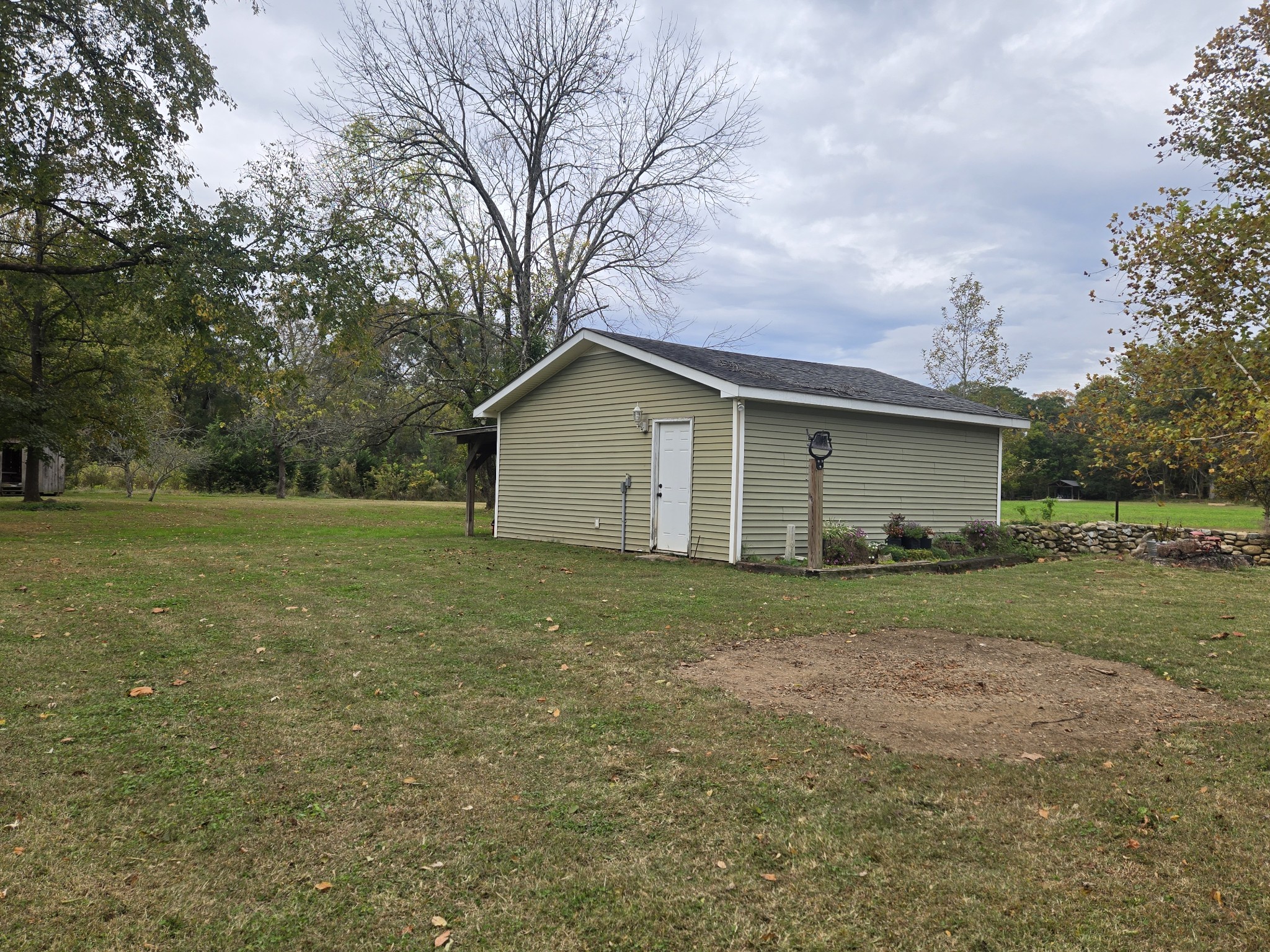 774 Sherrell Road Hillsboro, TN 37342 - Photo 22 of 70 a view of a house with backyard and garden