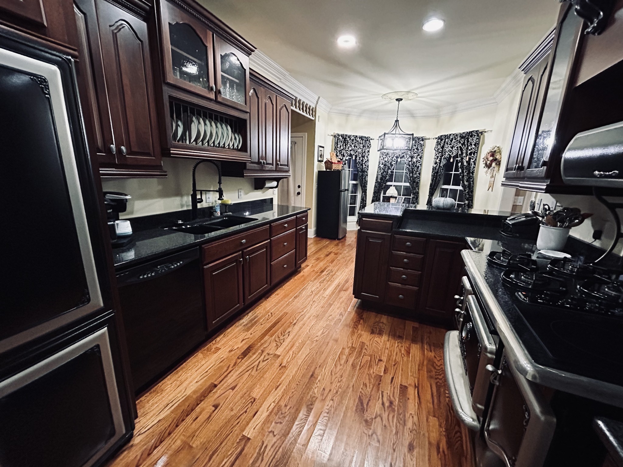 774 Sherrell Road Hillsboro, TN 37342 - Photo 39 of 70 a kitchen with stainless steel appliances granite countertop a stove and a refrigerator