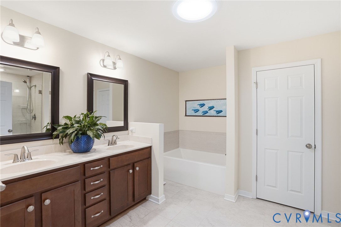 129 McRee Way Aylett, VA 23009 - Photo 27 of 56 Ceramic Tile / Double Vanities / Soaking Tub