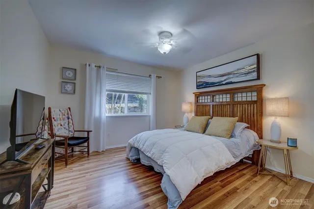 a view of storage and utility room with washer and dryer
