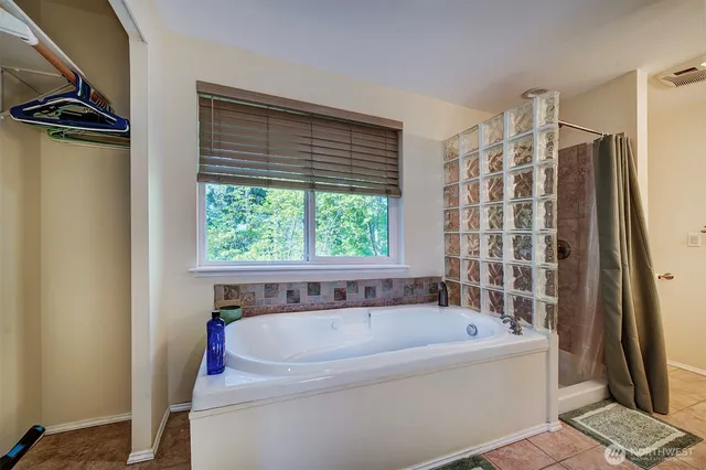 a view of an outdoor sitting area with furniture