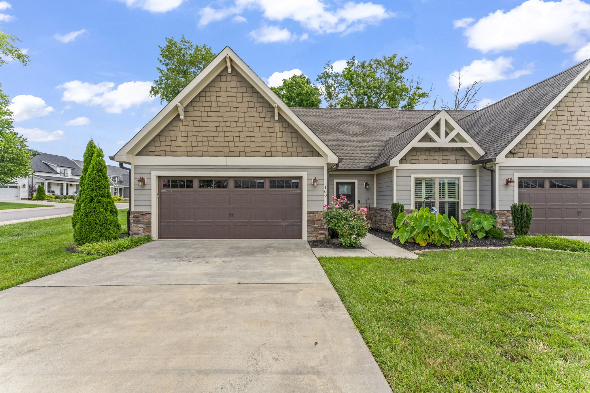 160 ANDERTON Drive Winchester, TN 37398 - Photo 3 of 41 a front view of a house with a yard