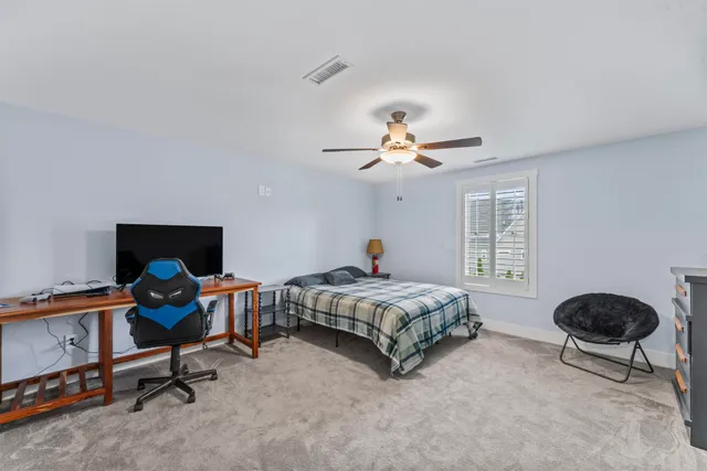 a view of a patio with a table chairs and a table
