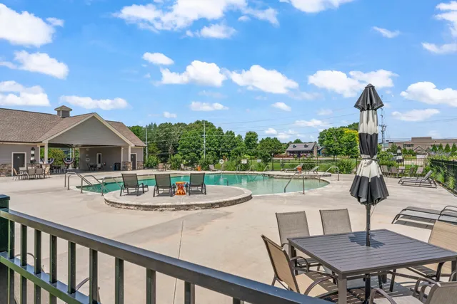 a view of a terrace with sitting area