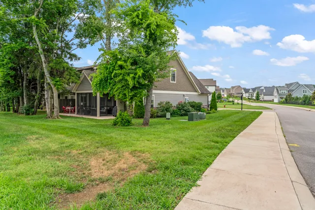 a view of a patio with a garden