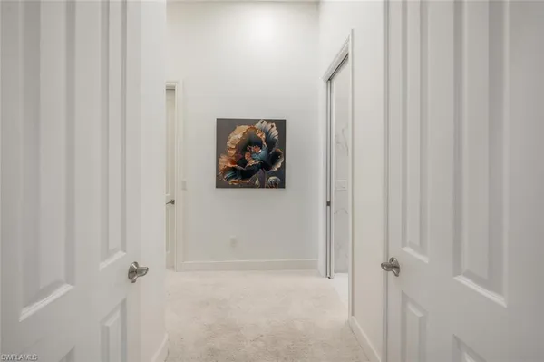 a bedroom with bed and flat screen tv