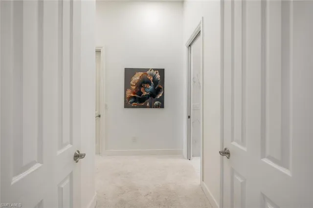 a bedroom with bed and flat screen tv