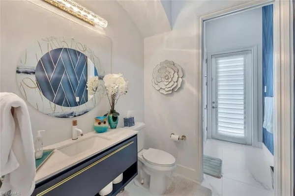 a outdoor dining space with furniture and outdoor view