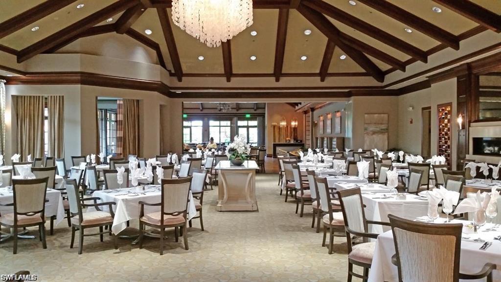 8957 Shenendoah Circle Naples, FL 34113 - Photo 48 of 50 a room with lots of tables and chairs