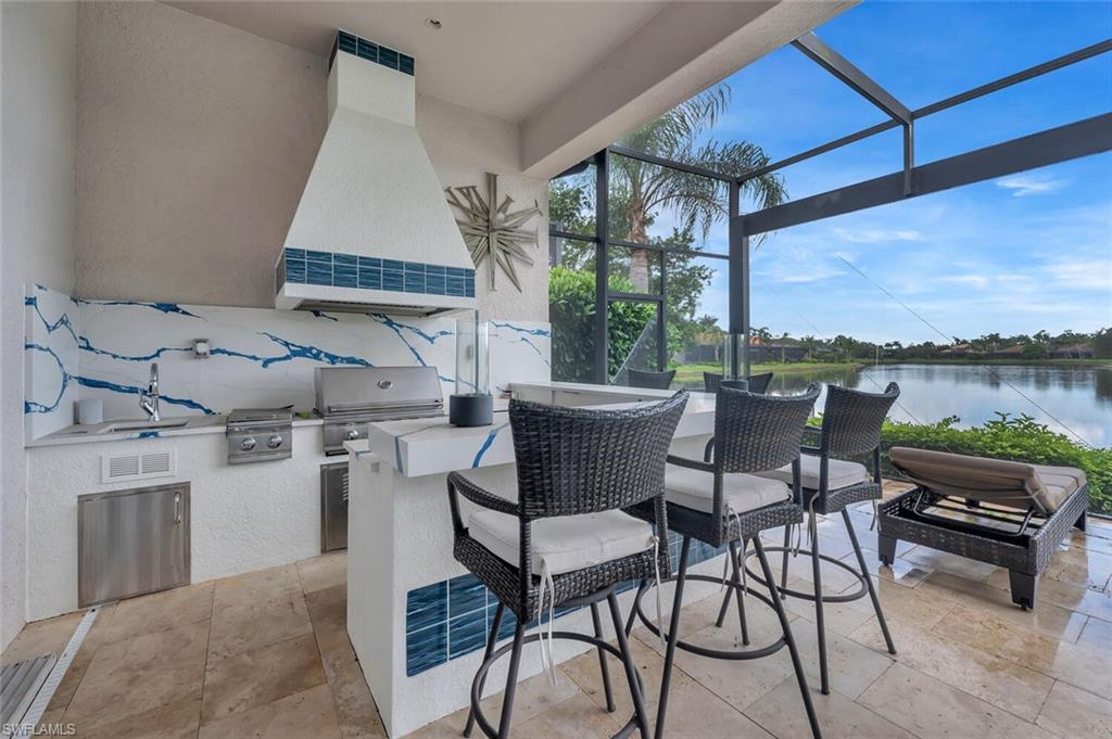 8957 Shenendoah Circle Naples, FL 34113 - Photo 6 of 50 a view of a chairs and table in patio