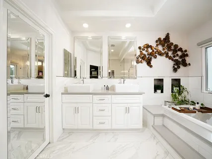 a kitchen with counter top space cabinets and stainless steel appliances